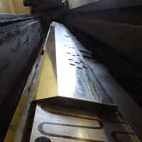 Grinding a guillotine blade