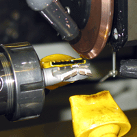 Grinding a PCD router cutter